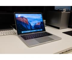 13-inch Macbook Pro with Touch Bar - 1