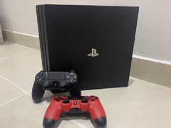 Playstation 4 Pro 1 TB with the box and 2 genuine controllers
