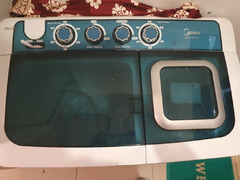 Good condition Midea 8kg Twin Tub washing machine for sale.