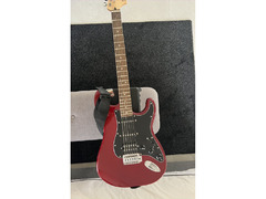 Electric Guitar with Fender AMP
