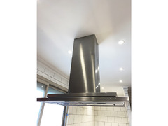 Gaggenau extractor hood, electric stove & oven.