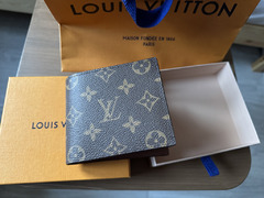 Louis Vuitton Multiple Wallet – Classic Elegance Meets Modern Functionality