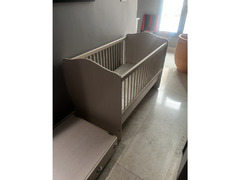 Baby crib with under storage