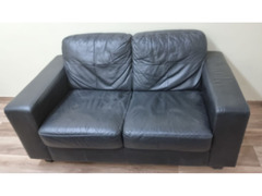 Beautiful Oak colored Office Table and Black Leather Sofa