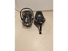 2 baby car seats and their bases