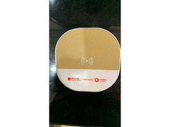 WIRELESS CHARGER WITH DIGITAL CLOCK.
