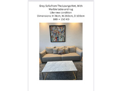 The Lounge Kw Grey sofa with marble table