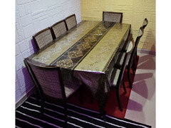 Wooden Dinning table with 8 chairs