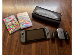 Original Nintendo Switch + 2 Games + Waterfield Case