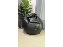 Two bean bags with pillows.